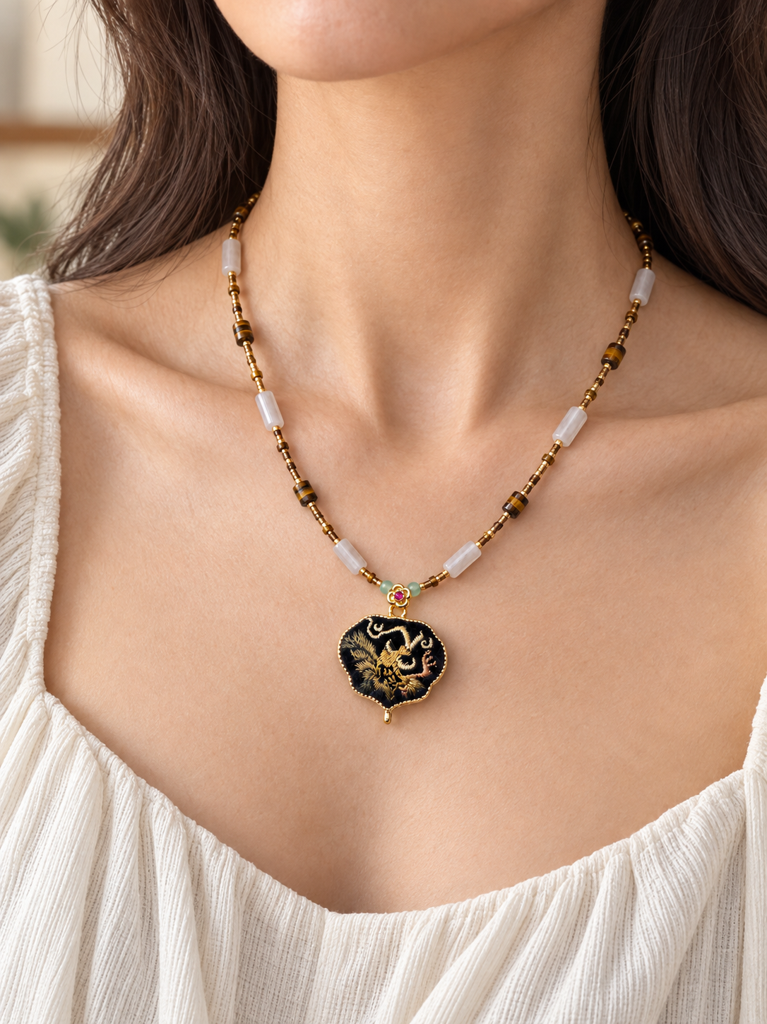 NECK-SBFN necklace shown in a close worn view on a model.