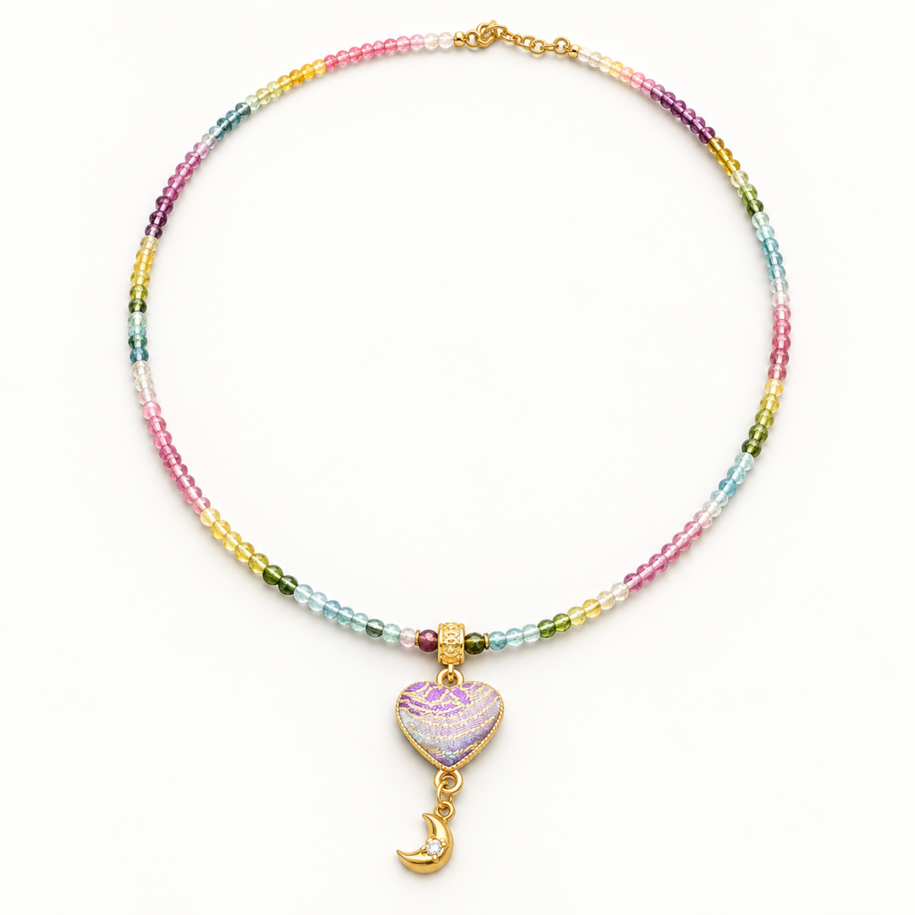 Multicolor tourmaline necklace with a purple Song brocade heart pendant and dangling crescent charm.