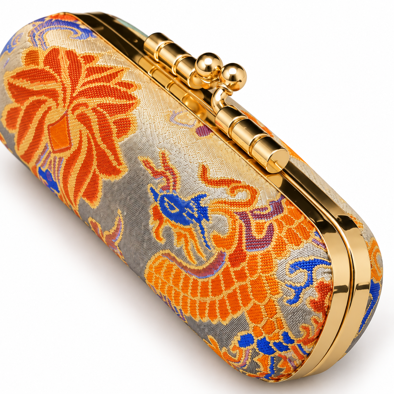 Close view of the clasp and woven orange pattern on the jewelry travel kit.