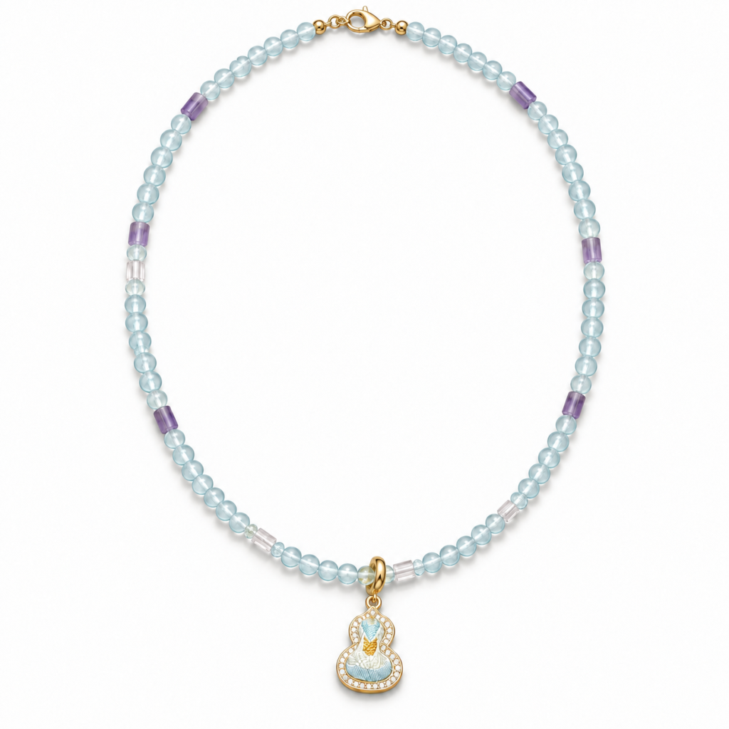 Pale blue and purple beaded necklace with a small Song brocade pendant on a light background