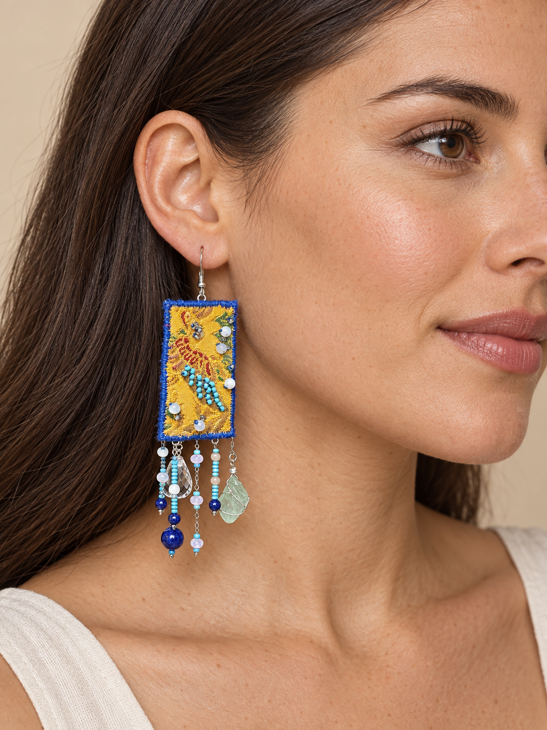 Inner Adventure Yellow & Blue Cascade Earrings worn in a close lifestyle view.