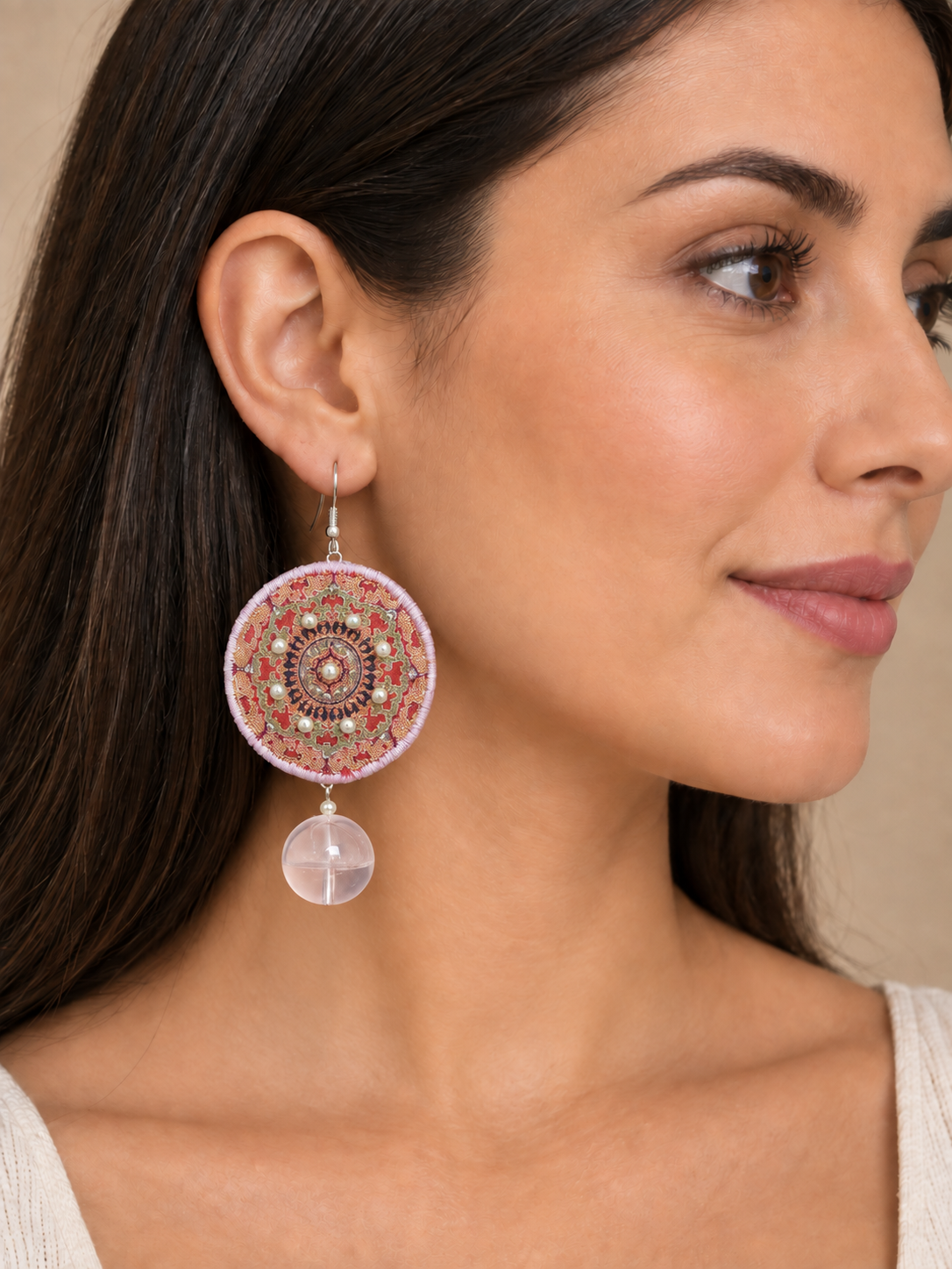 Inner Adventure Rose Mandala Disc Earrings worn in a close lifestyle view.