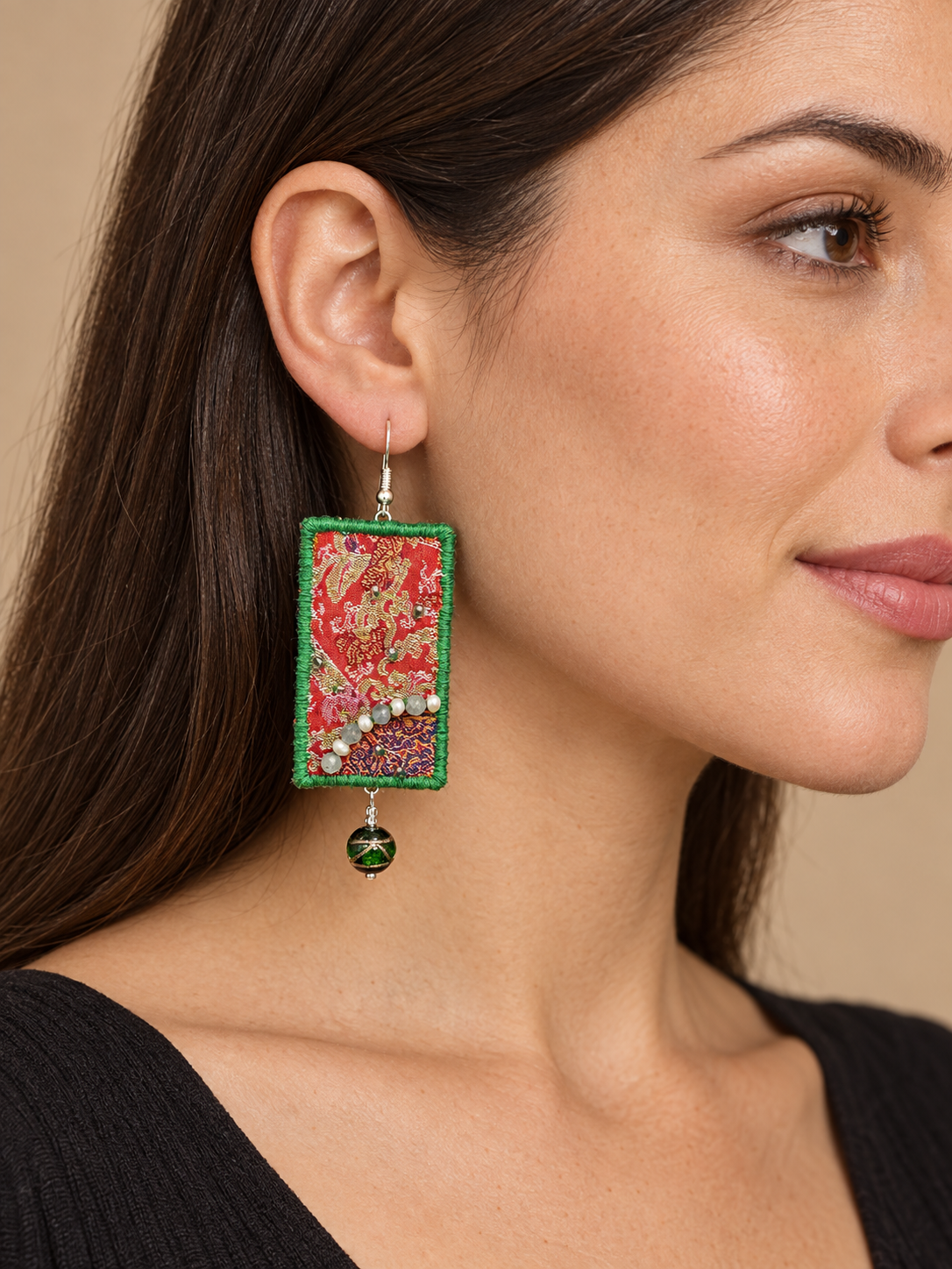 Inner Adventure Green-Edged Red Textile Earrings worn in a close lifestyle view.