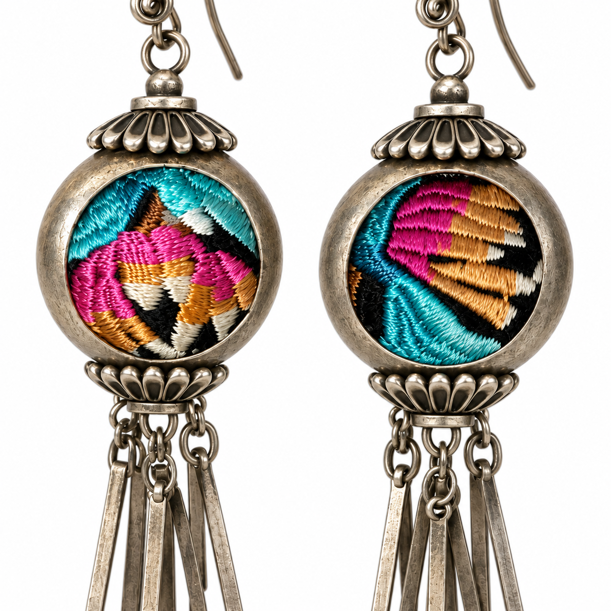Close detail of the Miao embroidery and silver fittings on the Miao Embroidery Cup Tassel Earrings pair.