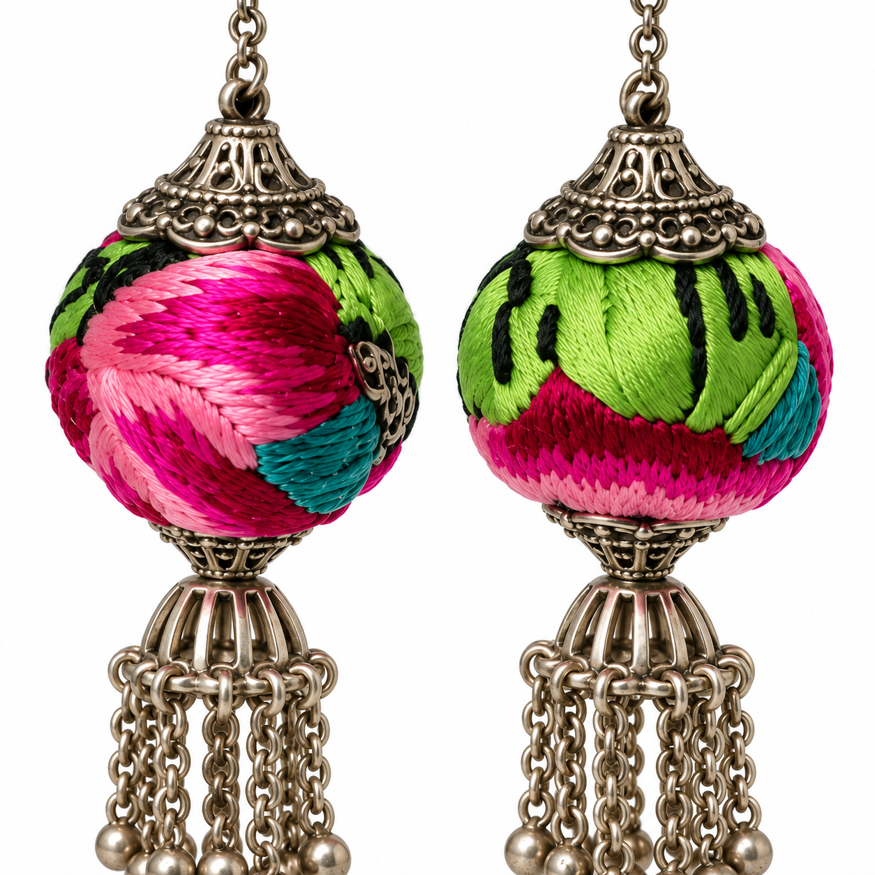 Close detail of the Miao embroidery and silver fittings on the Pink-Green Miao Embroidery Chain Tassel Earrings pair.